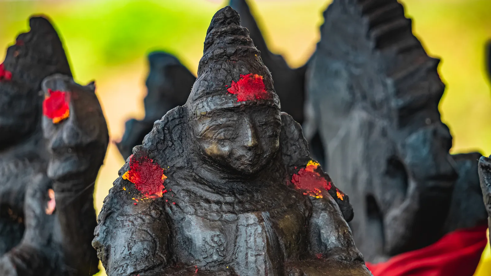 Stone Navagraha idols marked with vermilion